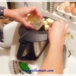 Drop cubes of butter through the Thermomix lid one after another