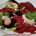 Carpaccio of beef, rosemary-smoked langoustines, caviar, young salad leaves